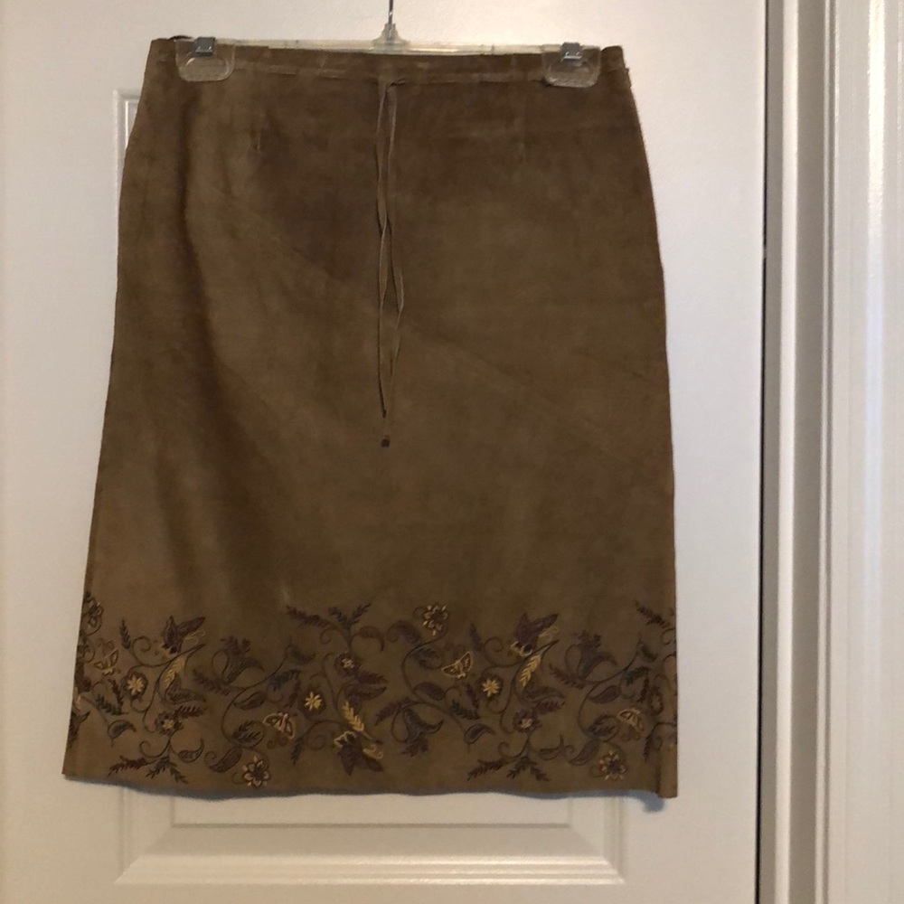 “Express” Tan suede skirt w/ tapestry print.